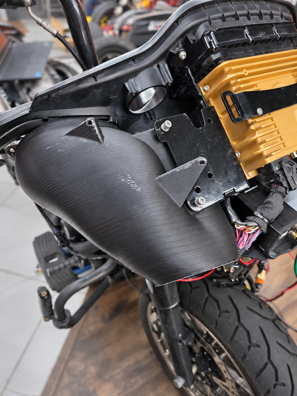 AVT 6.5-inch enclosure installed behind the Road Glide fairing. Pictured audio equipment is not included.